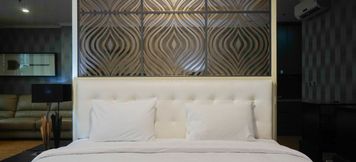 Bedroom 5 Studio Spacious with Sofa Bed at Ancol Mansion Apartment By Travelio