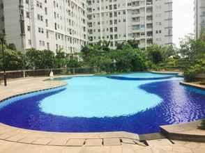 Swimming Pool 4 Strategic 2BR with Workspace @ Season City Apartment By Travelio