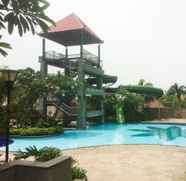 Swimming Pool 2 Strategic 2BR with Workspace @ Season City Apartment By Travelio