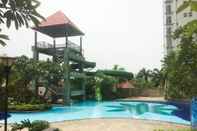 Swimming Pool Strategic 2BR with Workspace @ Season City Apartment By Travelio