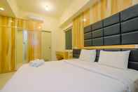 Bedroom Strategic 2BR with Workspace @ Season City Apartment By Travelio
