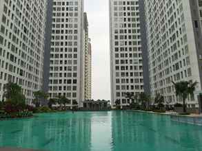 Swimming Pool 4 New Furnished 2BR at Serpong M-Town Residence Apartment By Travelio