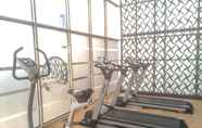 Fitness Center 6 Homey and Warm Studio at The Oasis Cikarang Apartment By Travelio