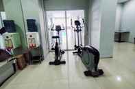 Fitness Center Simply Look Studio Apartment at Tamansari Mahogany Karawang By Travelio