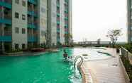 Swimming Pool 2 Comfy Modern Studio at The Nest Puri Apartment By Travelio