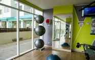 Fitness Center 4 Comfy Modern Studio at The Nest Puri Apartment By Travelio