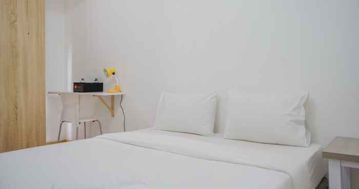 Bedroom Cozy Stay Studio @ M-Town Residence Apartment By Travelio