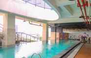 Swimming Pool 2 Elegant and Cozy 1BR Apartment @ Atlanta Residences By Travelio