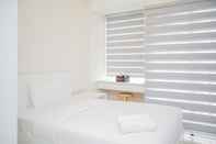 Kamar Tidur Simply Furnished Studio at Saveria Apartment By Travelio