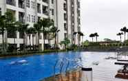 Swimming Pool 3 Simply Furnished Studio at Saveria Apartment By Travelio