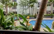 Swimming Pool 4 Simply Furnished Studio at Saveria Apartment By Travelio