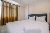 Bedroom Cozy and Minimalist 2BR Apartment at Kalibata City Residence By Travelio
