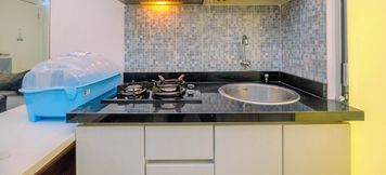 Common Space 3 Cozy and Minimalist 2BR Apartment at Kalibata City Residence By Travelio