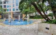 Swimming Pool 4 Exclusive and Strategic 1BR @ Casa Grande Apartment By Travelio