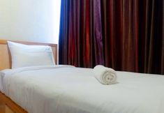 침실 2 Best View 2BR at Tamansari Papilio Apartment By Travelio