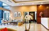Lobby 2 Best View 2BR at Nifarro Park Apartment By Travelio