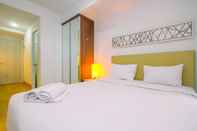 Bedroom Modern Style Studio at Azalea Suites Apartment with City View By Travelio