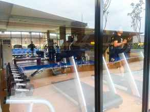 Fitness Center 4 Modern Style Studio at Azalea Suites Apartment with City View By Travelio