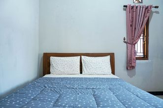 卧室 4 Relaxing 4 Bedrooms Soga Homestay Manukan