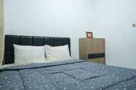 ห้องนอน Comfy 3 BR Kenanga Homestay Wonocatur