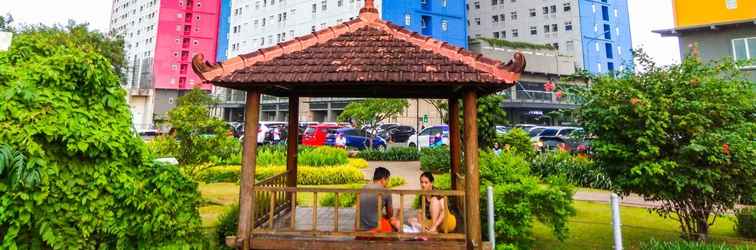 Lobby Homey 2BR with Sofa Bed Green Pramuka Apartment By Travelio