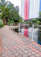 LOBBY 2 BR with Pool View at Green Pramuka Apartment By Travelio