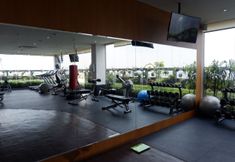 Fitness Center 4 Exclusive and Homey 1 BR L'Avenue Apartment By Travelio