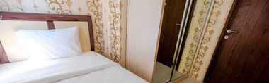 Bedroom 2 Homey Apartment 2 BR Northland Ancol Residence Near Ancol By Travelio