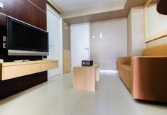Ruang Umum 3 Comfy 2 BR Bassura City Apartment By Travelio
