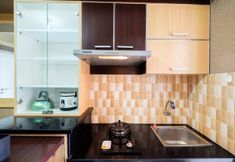 Ruang Umum 5 Comfy 2 BR Bassura City Apartment By Travelio