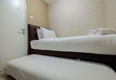 Bilik Tidur 2 Comfy 2 BR Bassura City Apartment By Travelio