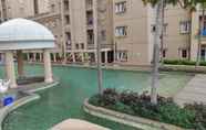 Swimming Pool 7 Nice and Simple Style 2 BR Grand Palace Kemayoran Apartment By Travelio