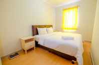 Kamar Tidur Nice and Simple Style 2 BR Grand Palace Kemayoran Apartment By Travelio