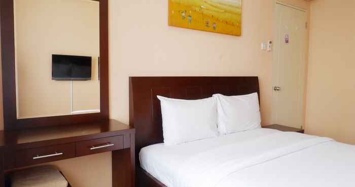 Bedroom Homey 2BR Cosmo Terrace Apartment with Direct Access to Thamrin City Mall By Travelio