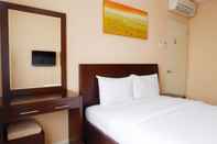 Bedroom Homey 2BR Cosmo Terrace Apartment with Direct Access to Thamrin City Mall By Travelio