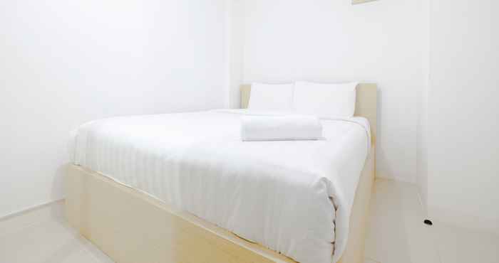 Bedroom Minimalist & Clean 2BR Bassura City Apartment By Travelio