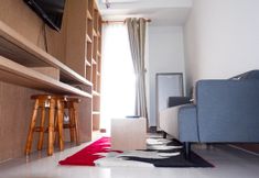 Lobby 2 Minimalist 1BR Scientia Residence Apartment near Summarecon Mall Gading Serpong By Travelio