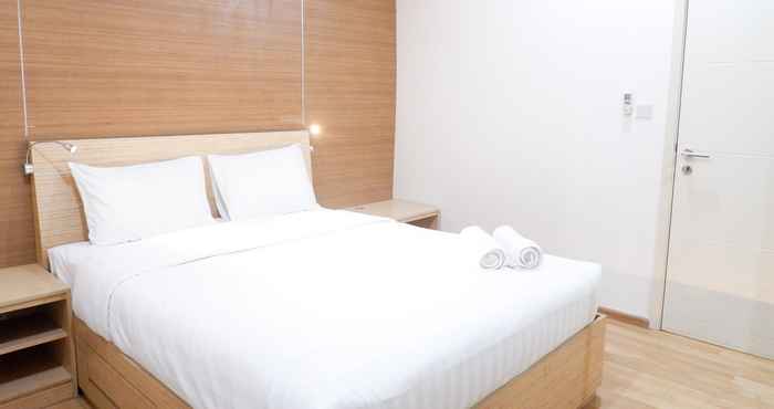 Kamar Tidur Simple 1BR Casa Grande Apartment with Sofabed Connected to Kota Kasablanka By Travelio