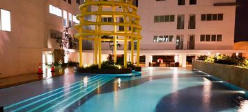 Swimming Pool 4 Cozy and Modern Studio Bassura City Apartment By Travelio