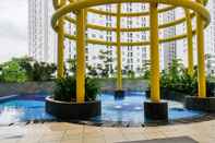 Swimming Pool Nice and Compact 2BR Bassura City Apartment near Jatinegara By Travelio