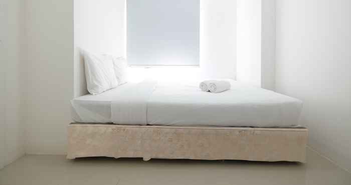 Bedroom Nice and Compact 2BR Bassura City Apartment near Jatinegara By Travelio