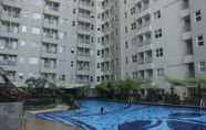 Swimming Pool 6 Spacious 2BR Apartment at Parahyangan Residence near Parahyangan University By Travelio