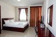 Bilik Tidur Classic Homey Studio Apartment at The Lavande Residence By Travelio