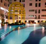 Swimming Pool 3 Affordable Comfy Studio with Sofa Bed at Bassura City Apartment By Travelio