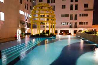 Swimming Pool 4 Affordable Comfy Studio with Sofa Bed at Bassura City Apartment By Travelio