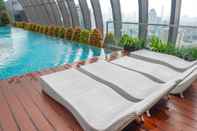 Swimming Pool Clean 1BR L'Avenue Apartment By Travelio