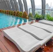 Swimming Pool 3 Clean 1BR L'Avenue Apartment By Travelio