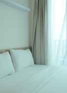 BEDROOM Homey and Brand New Studio Tree Park Apartment near ICE BSD By Travelio