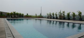 Swimming Pool 3 Homey and Brand New Studio Tree Park Apartment near ICE BSD By Travelio