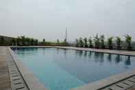 Swimming Pool Homey and Brand New Studio Tree Park Apartment near ICE BSD By Travelio